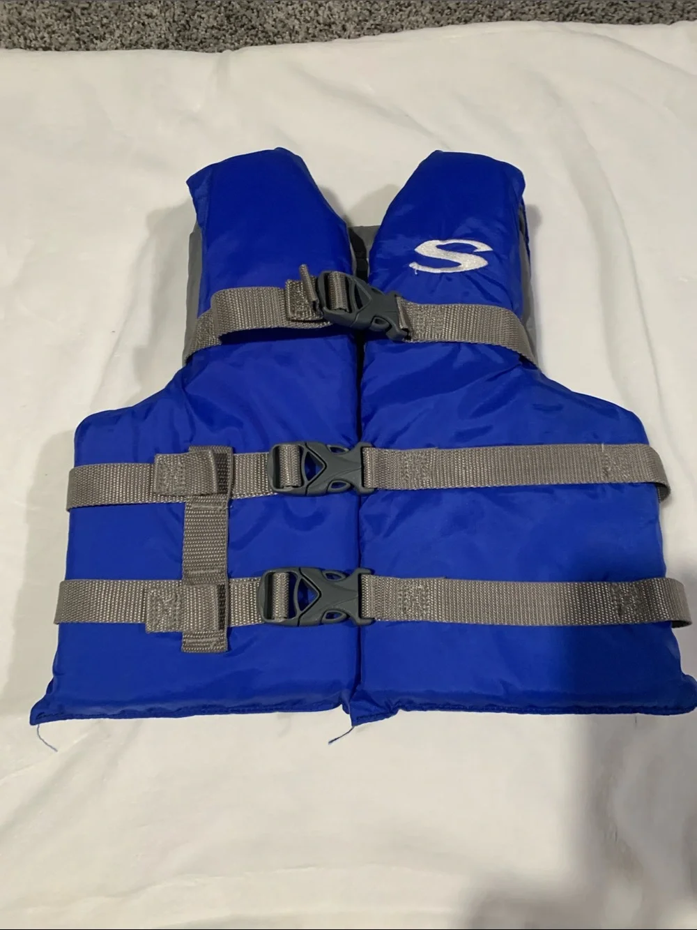 Youth Swim Life Jacket in Royal Blue with Adjustable Gray Straps